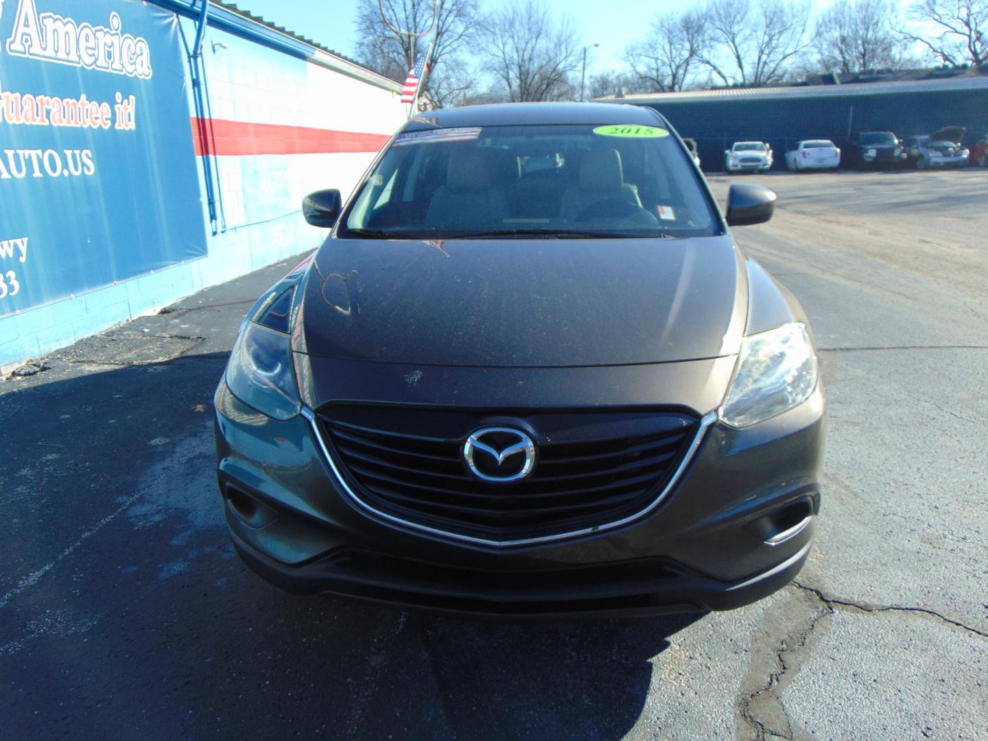 2015 Black MAZDA CX-9 (JM3TB3CA7F0) with an V6 3.7 Liter engine, Auto, 6-Spd Sportshift transmission, located at 2105 Dixie Hwy, Louisville, KY, 40210, (502) 772-3333, 38.220932, -85.795441 - Photo#4